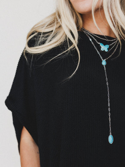 The Nest Moon Glow Texture Knit Top - Black